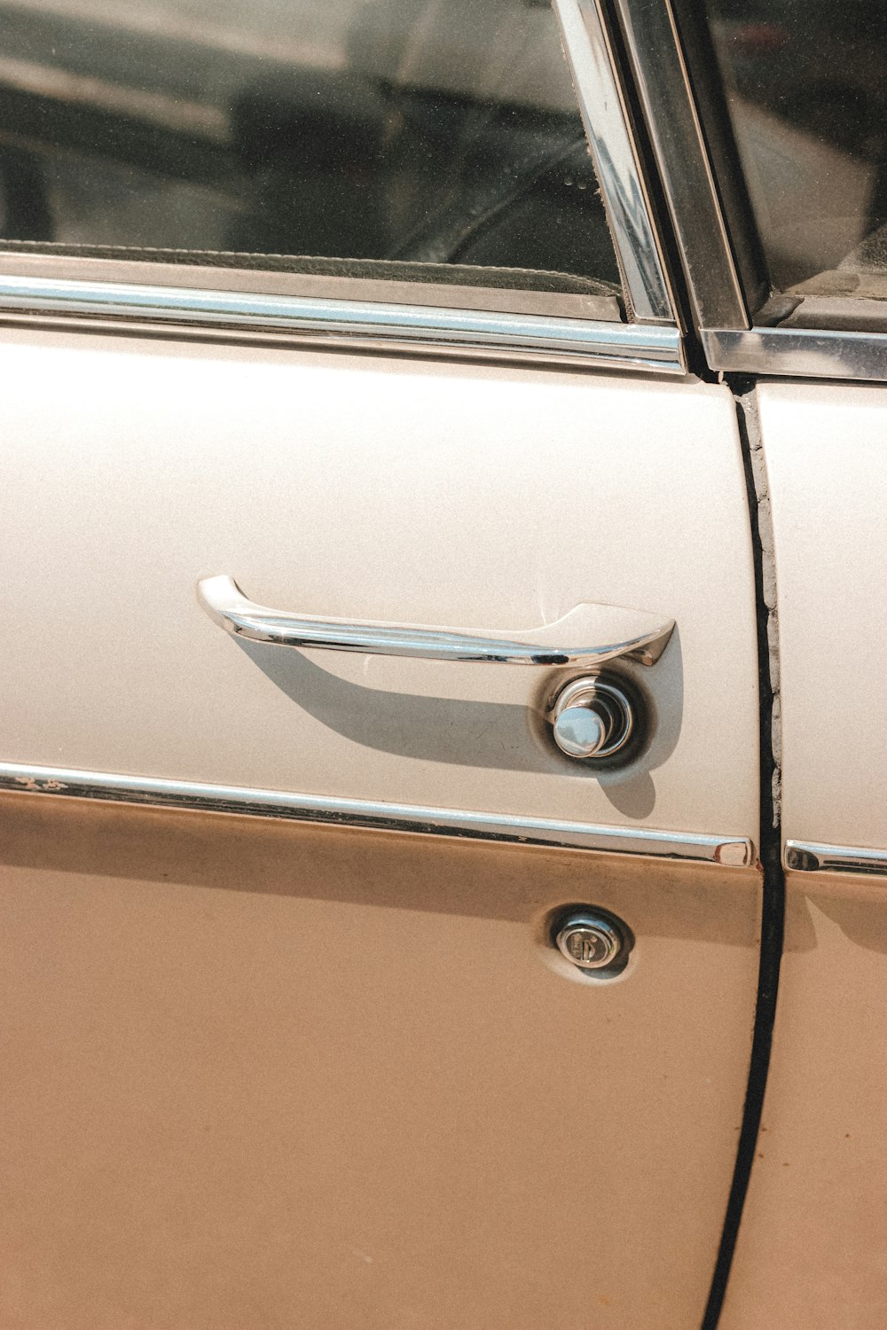 silver car door handle bar