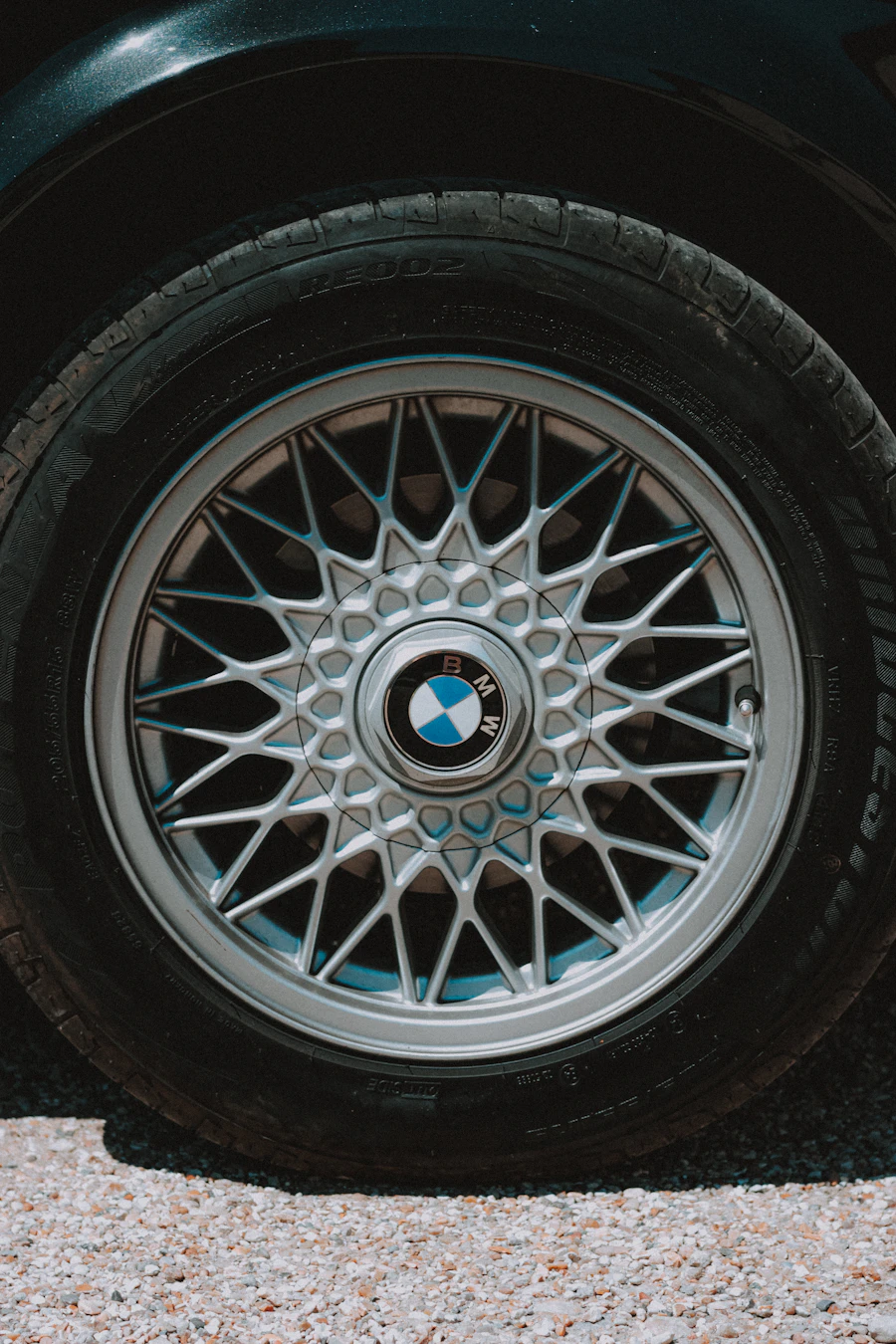 Full grey multi-spoke alloy wheel with tyre
