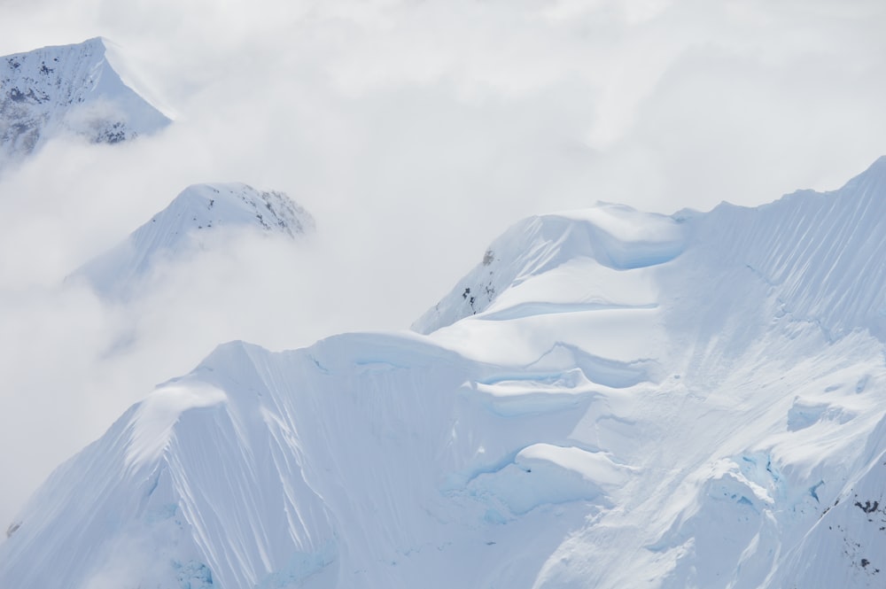 snow covered mountain during daytime