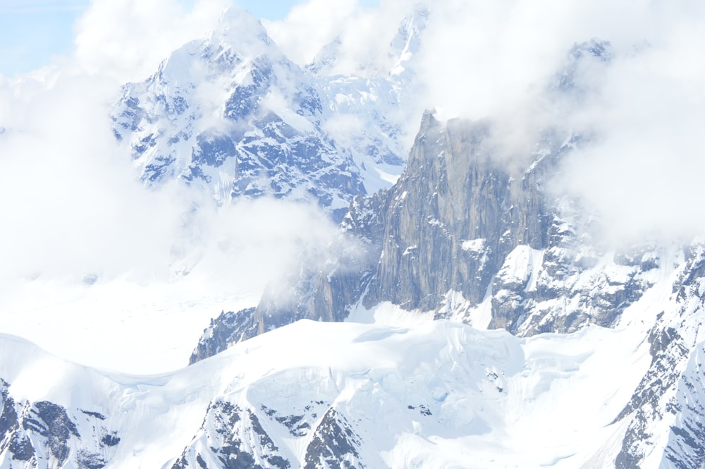 snow covered mountain during daytime