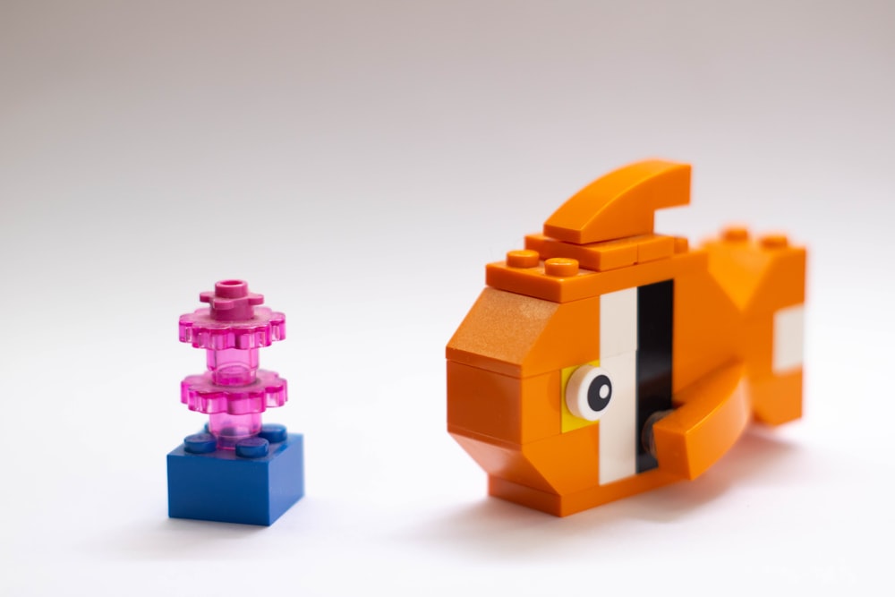 yellow blue and pink lego blocks