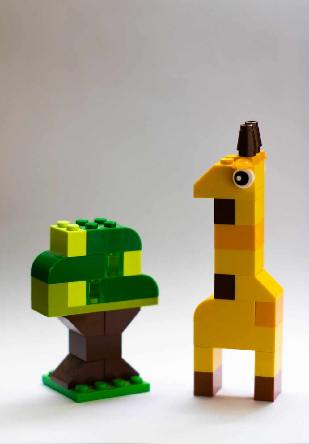 yellow green and brown lego blocks