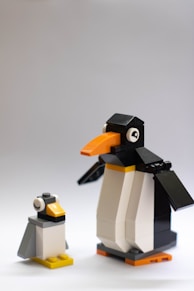 white and black robot toy