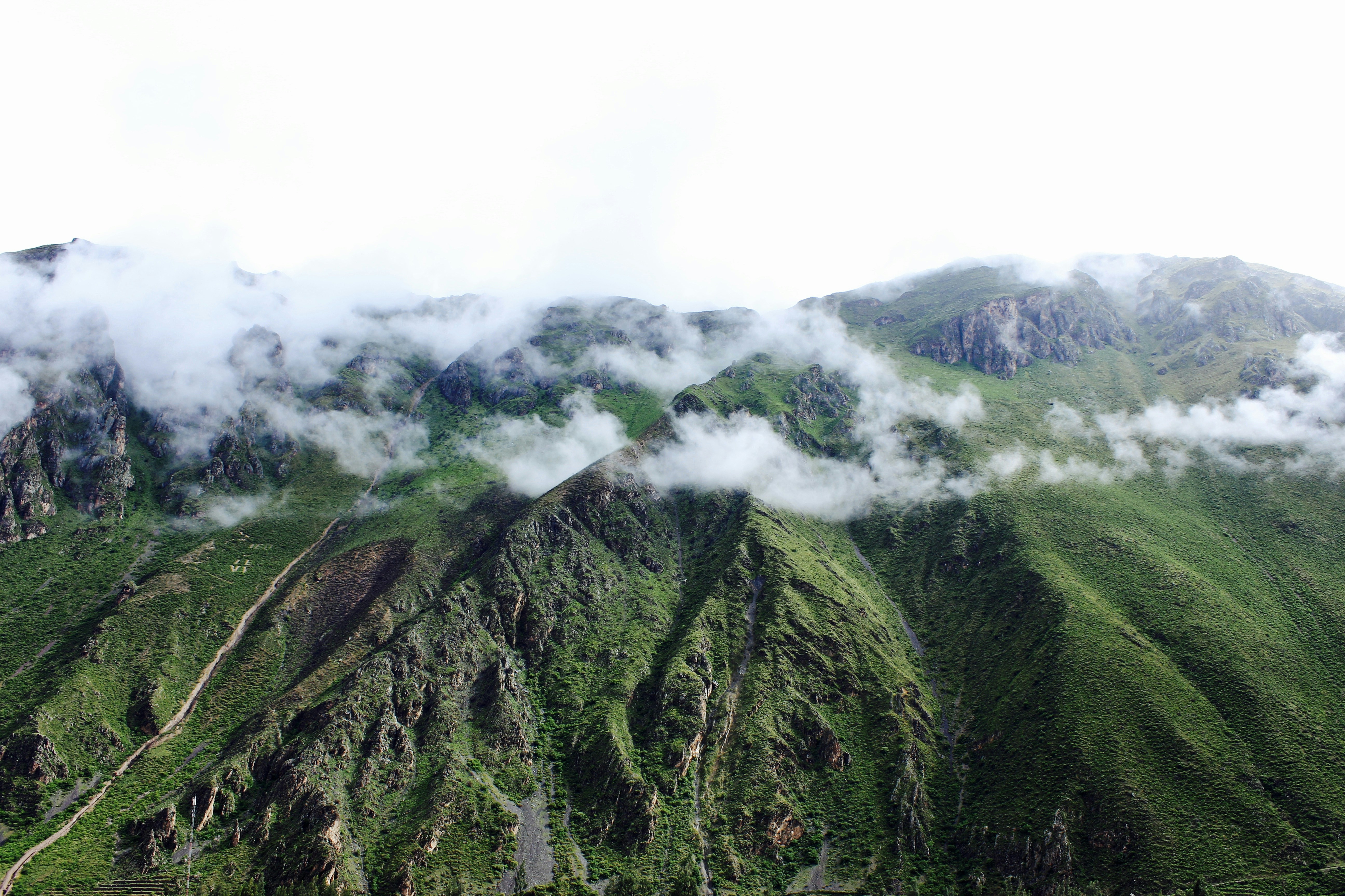 green mountain covered with clouds, 