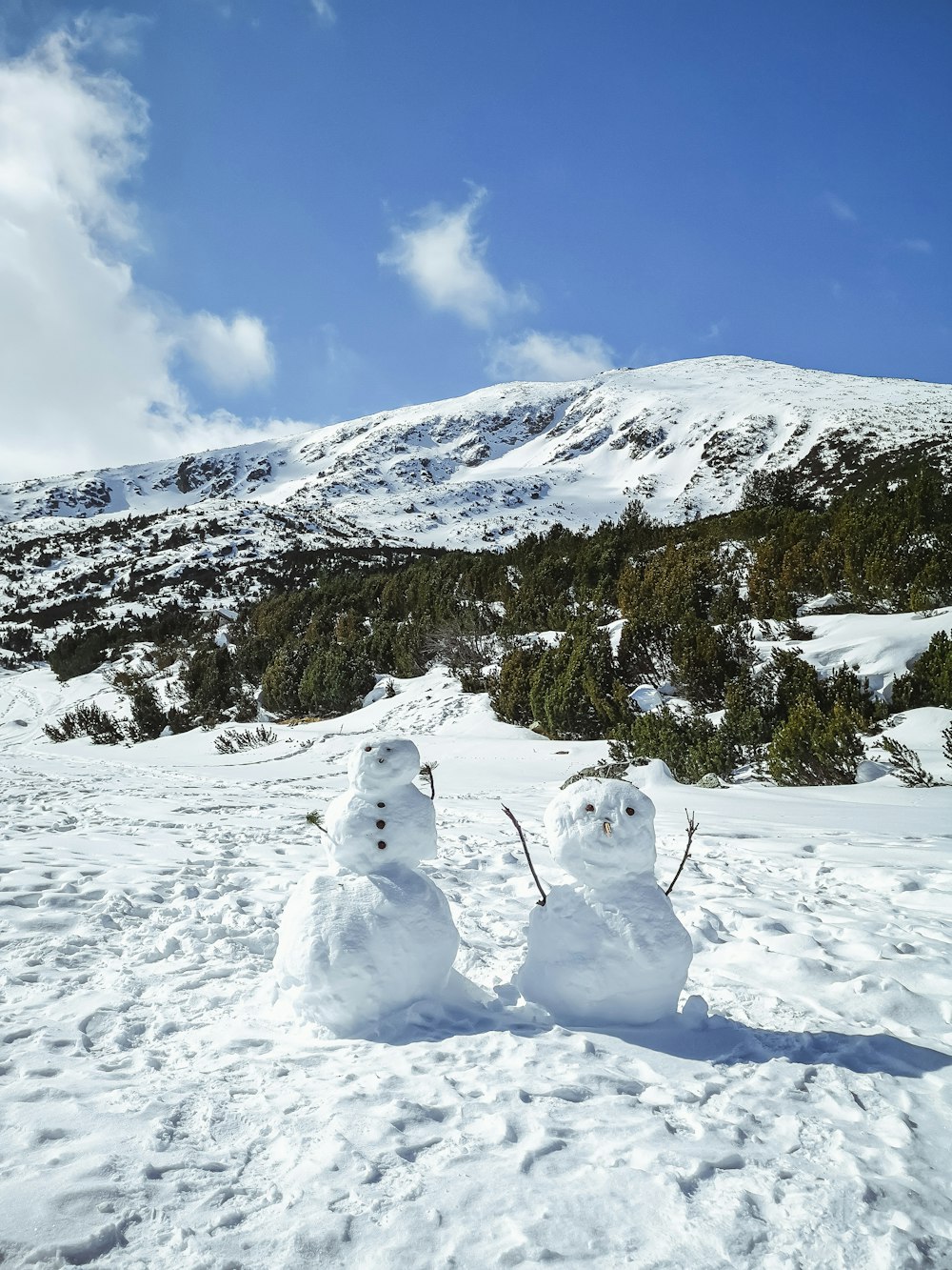 white snow covered mountain under blue sky during daytime