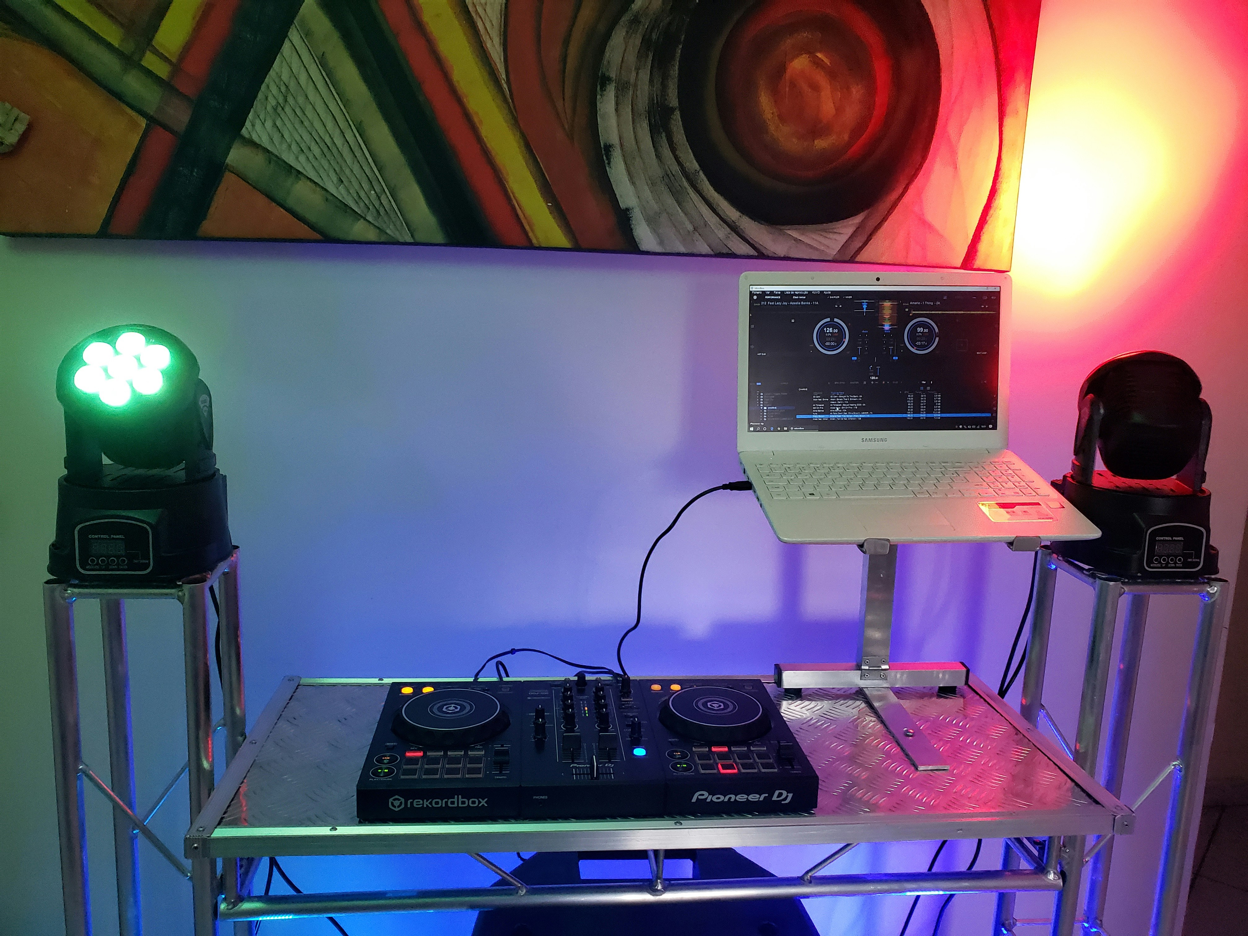 DJ equipment and music production setup with colorful lights