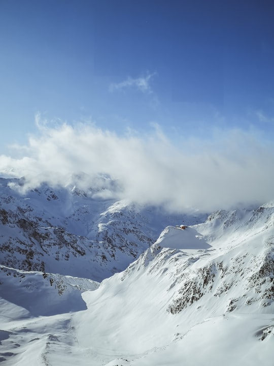 snow covered mountain under blue sky during daytime in Stubaital Austria