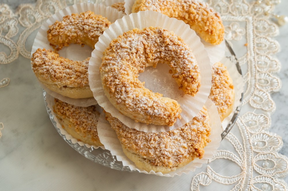 brown donuts on white ceramic plate