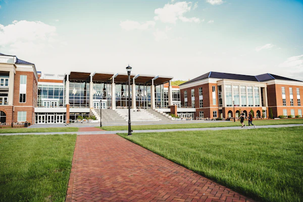 Students walking between classes on a college campus