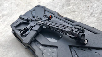 black rifle on black plastic case
