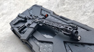 black rifle on black plastic case