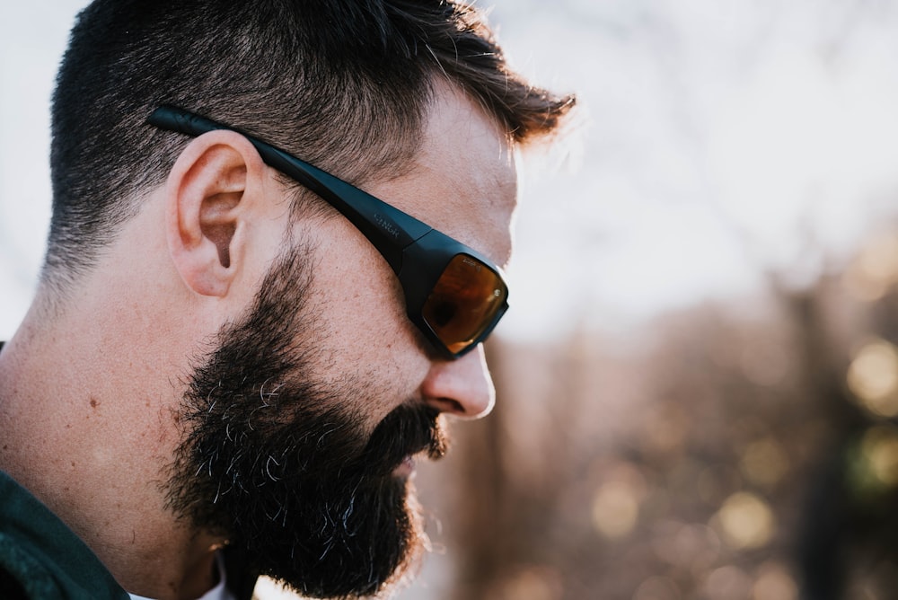 man wearing black framed sunglasses