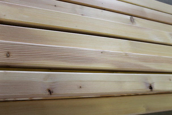 Close-up of a sturdy wooden pallet freshly crafted with smooth edges and natural wood grain.
