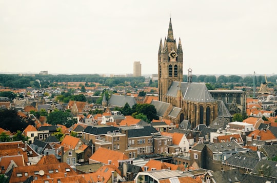 brown and gray concrete building during daytime in Delft Netherlands