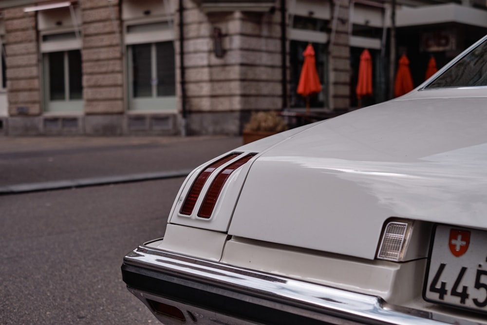 white car on road during daytime