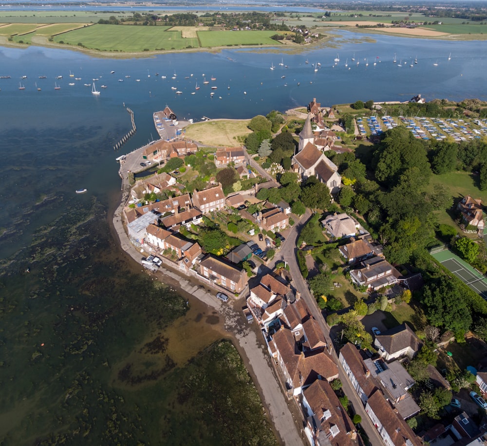 aerial view of city near body of water during daytime