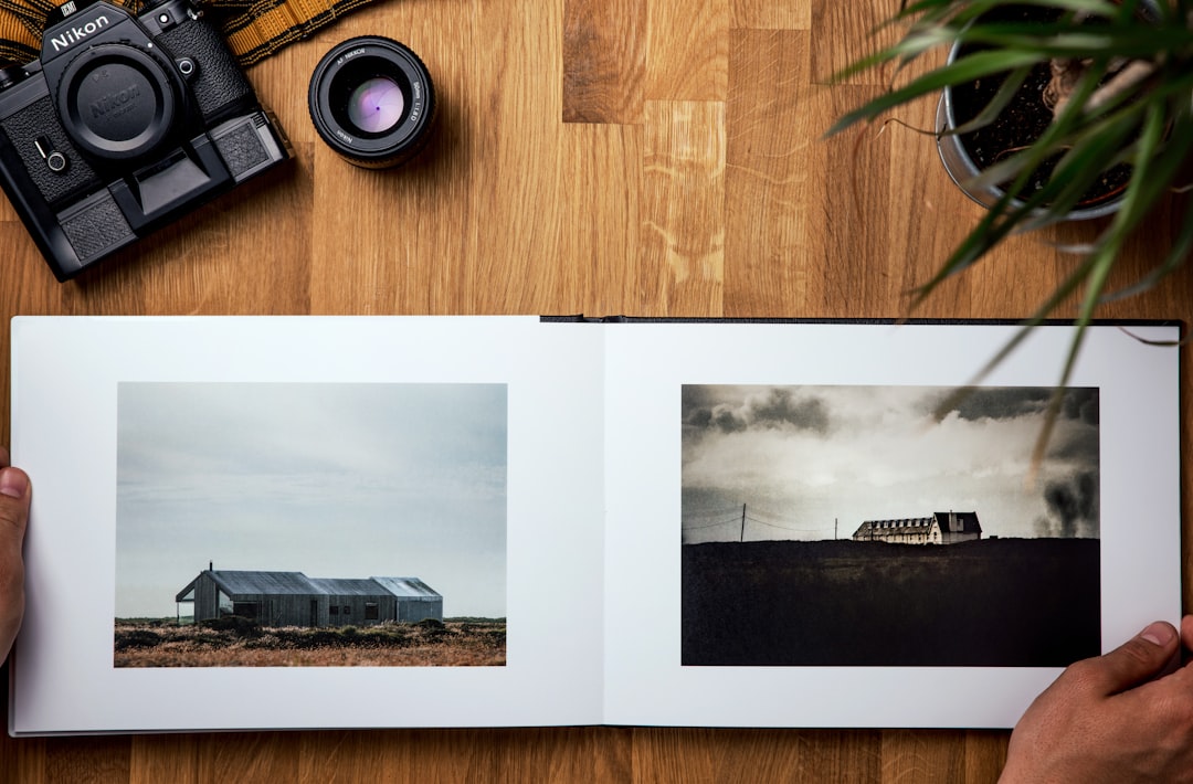 black camera on brown wooden table