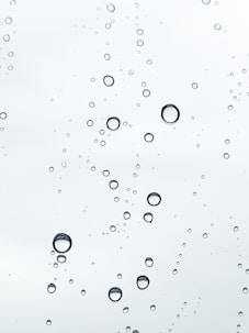 water droplets on glass panel