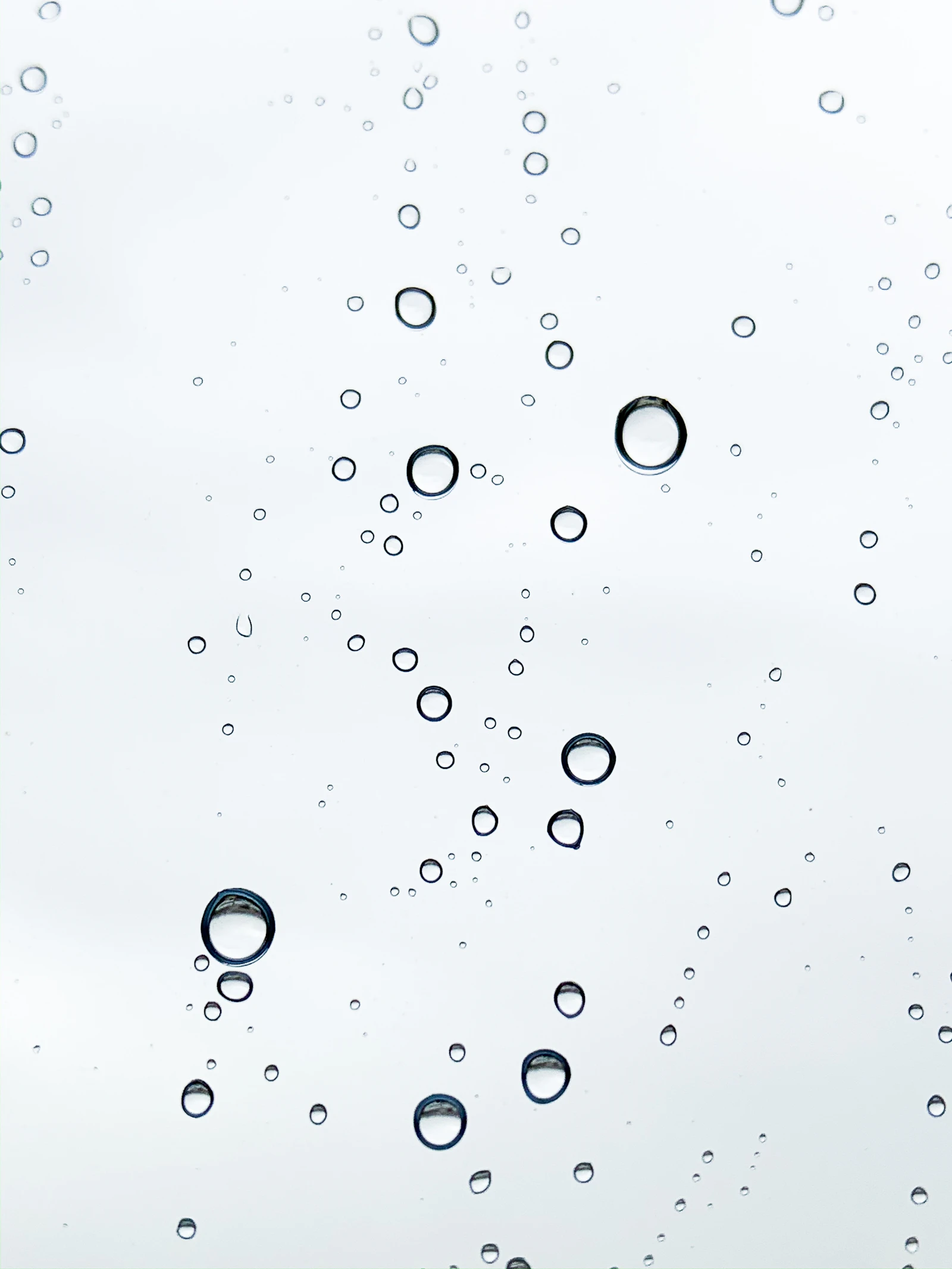 A hydrating skincare serum with visible water droplets, representing a hydration serum comparison