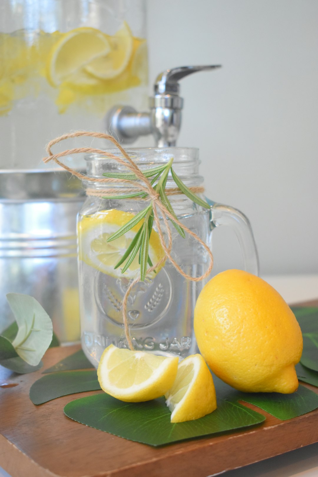 lemon fruit on clear glass pitcher