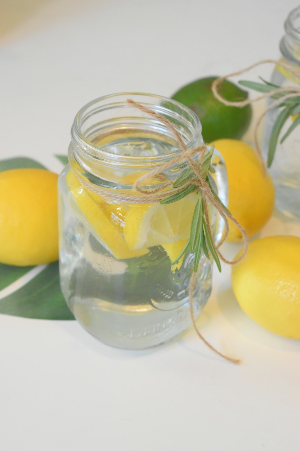 lemon fruit in clear glass jar
