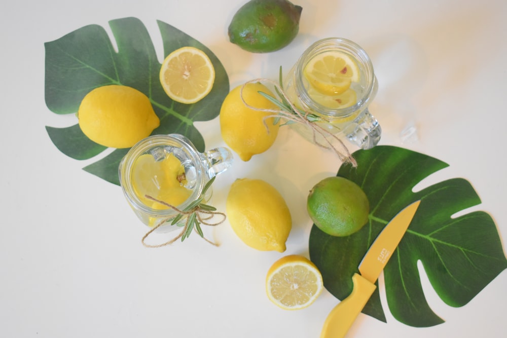 sliced lemon on clear glass jar