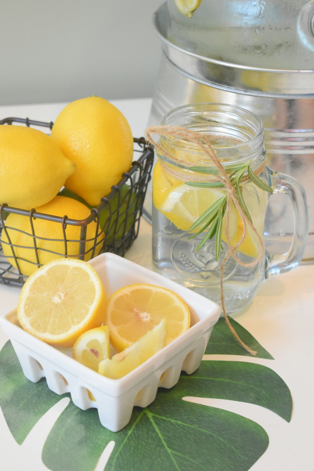clear glass pitcher with lemon fruits