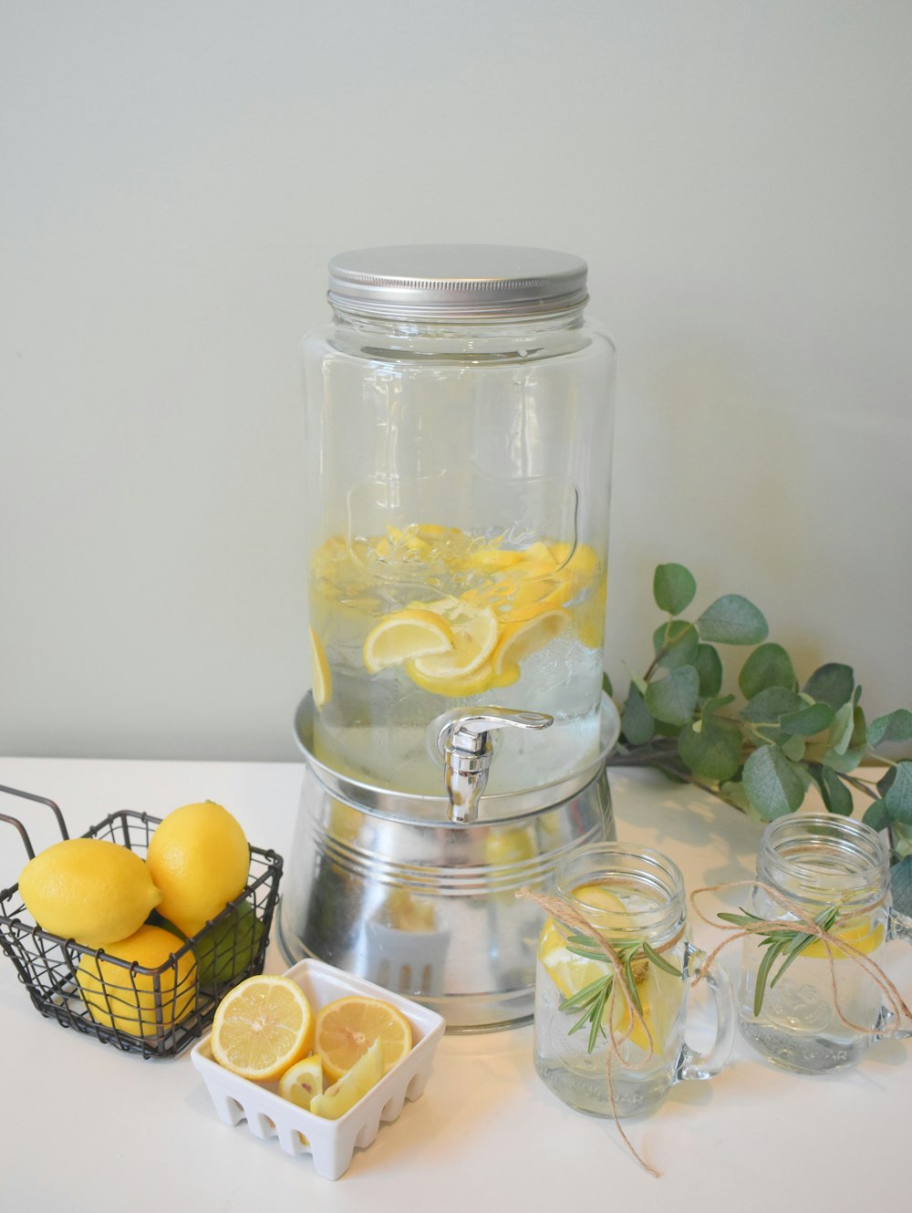 clear glass jar with yellow fruits