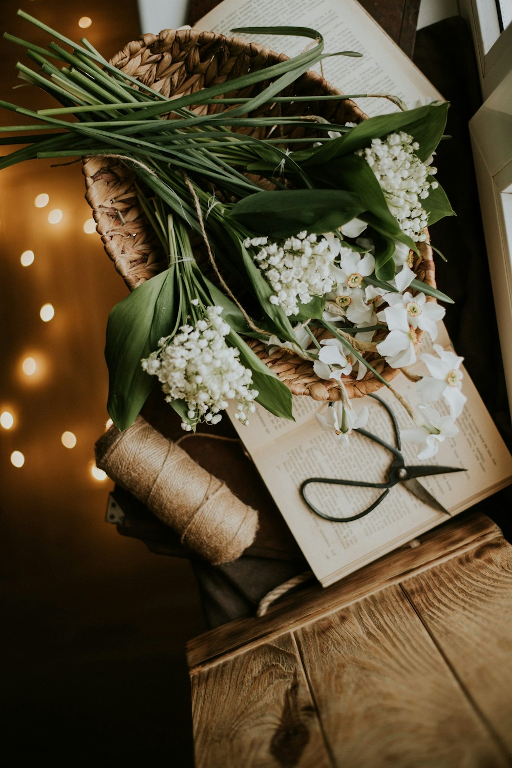 white flowers on brown rolled paper