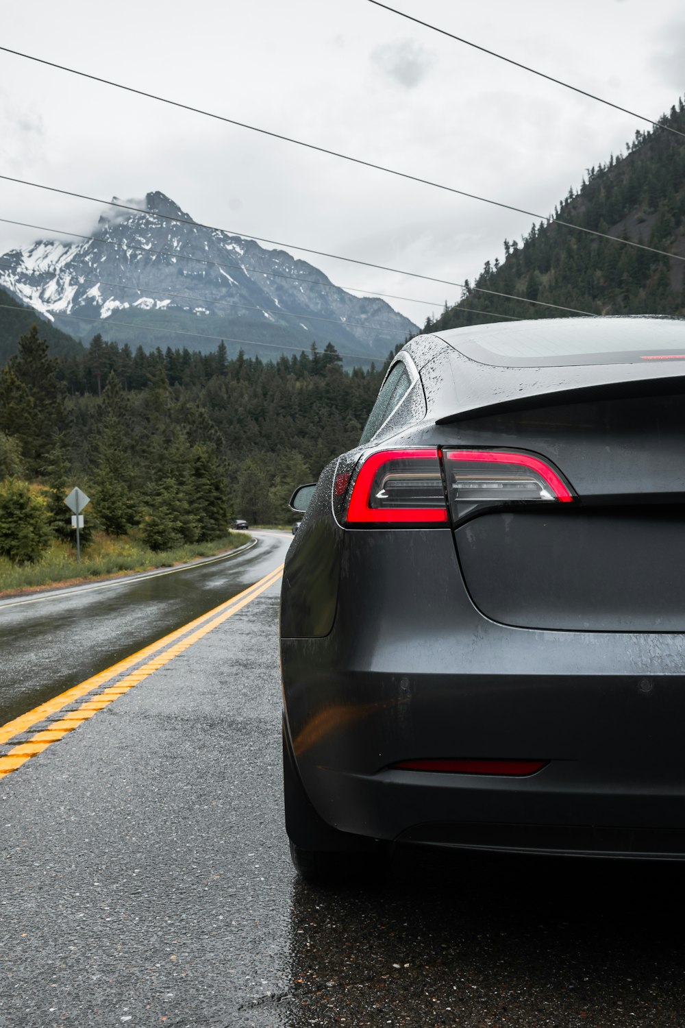 black car on road during daytime