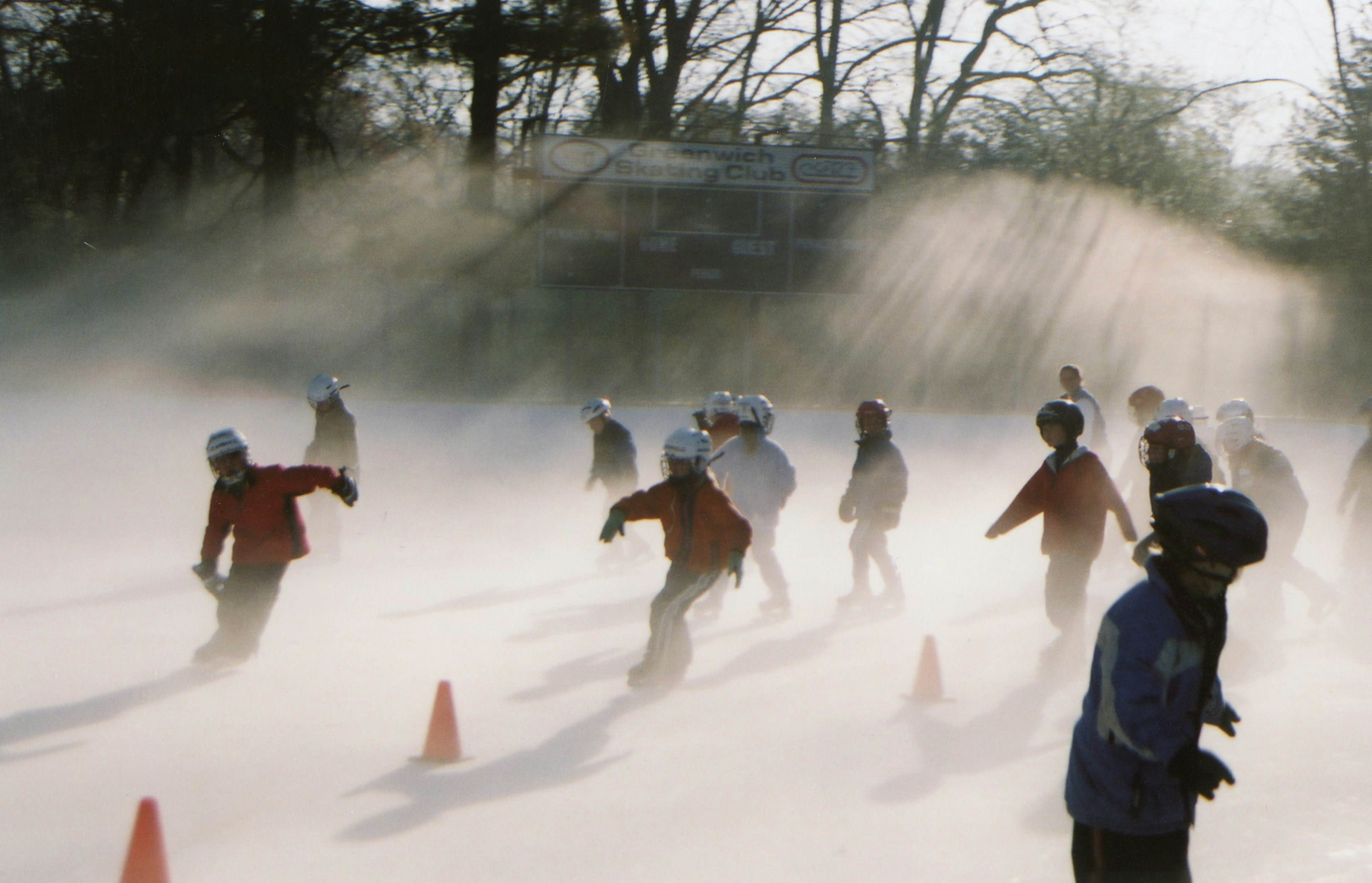 people walking on snow covered ground during daytime