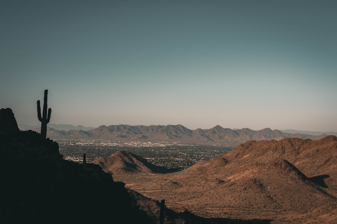 brown mountains under blue sky during daytime