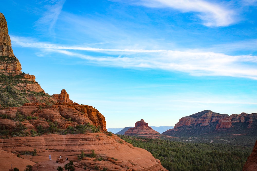 brown rocky mountain under blue sky during daytime