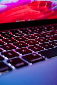red and black laptop computer