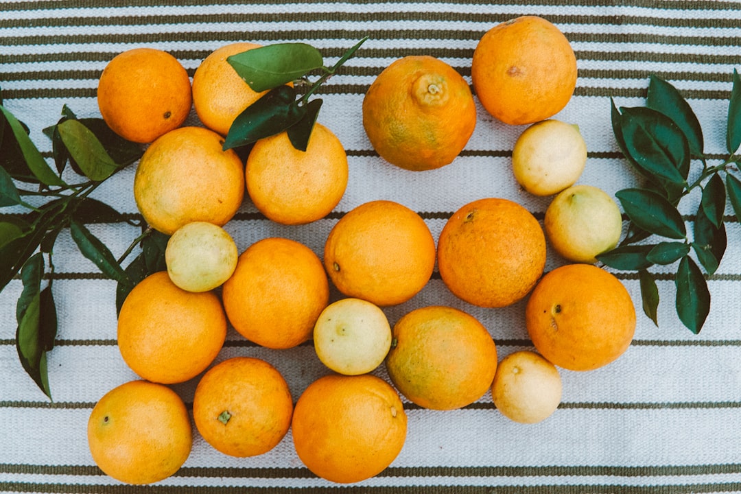 orange fruits on white tray