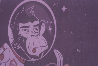 An illustration of a cute alien character wearing a beanie hat, surrounded by stars.