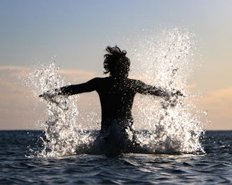 woman in water during daytime