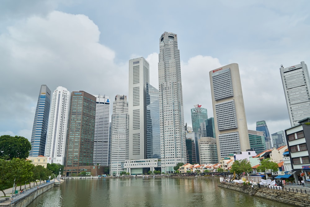 city buildings near body of water during daytime