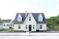 white and brown concrete house