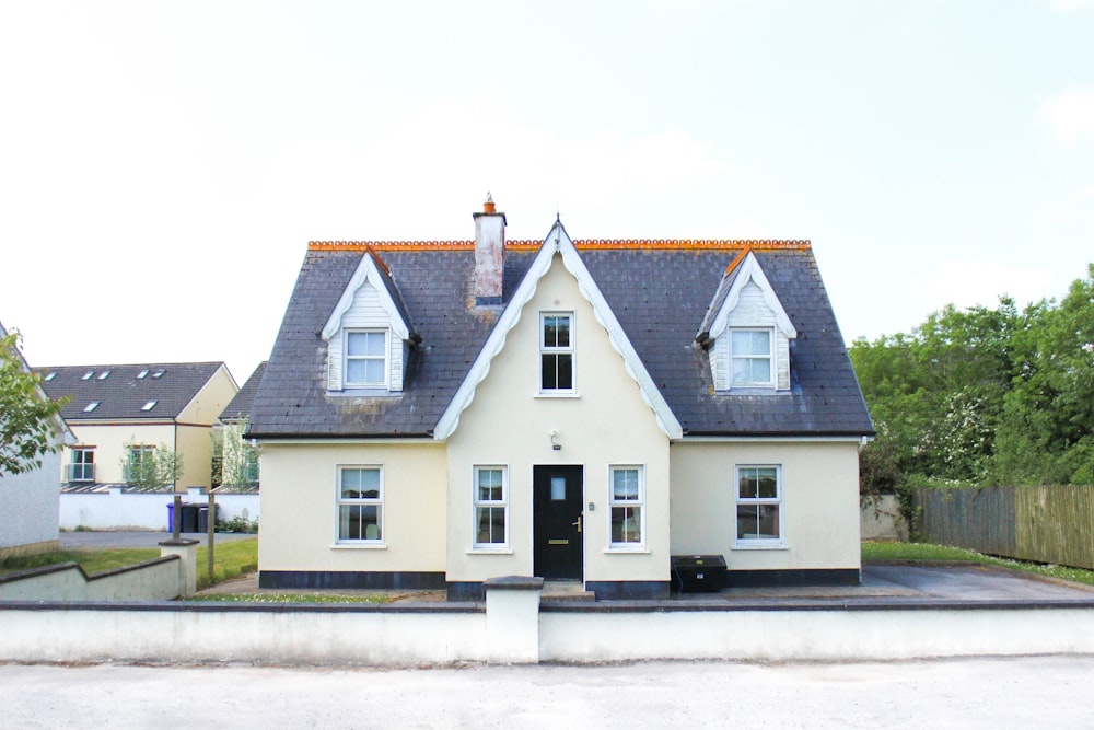 white and brown concrete house