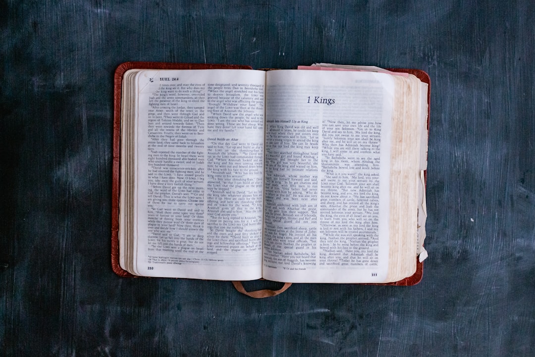 white book page on brown wooden table