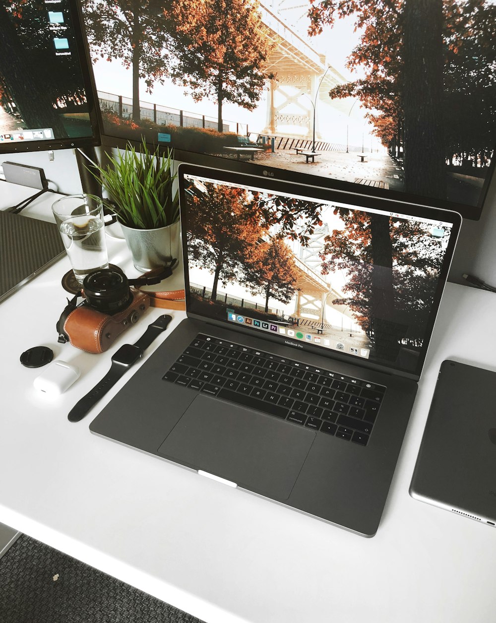 macbook pro on white table