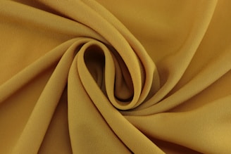 brown textile in close up photography