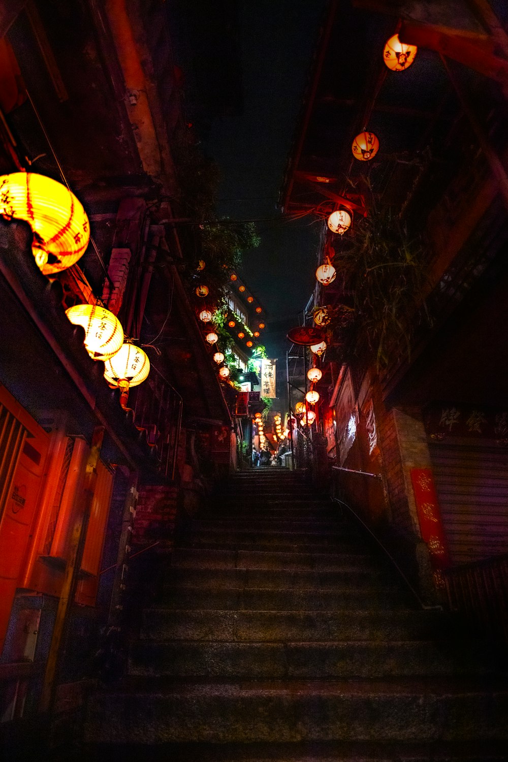 people walking on street during nighttime