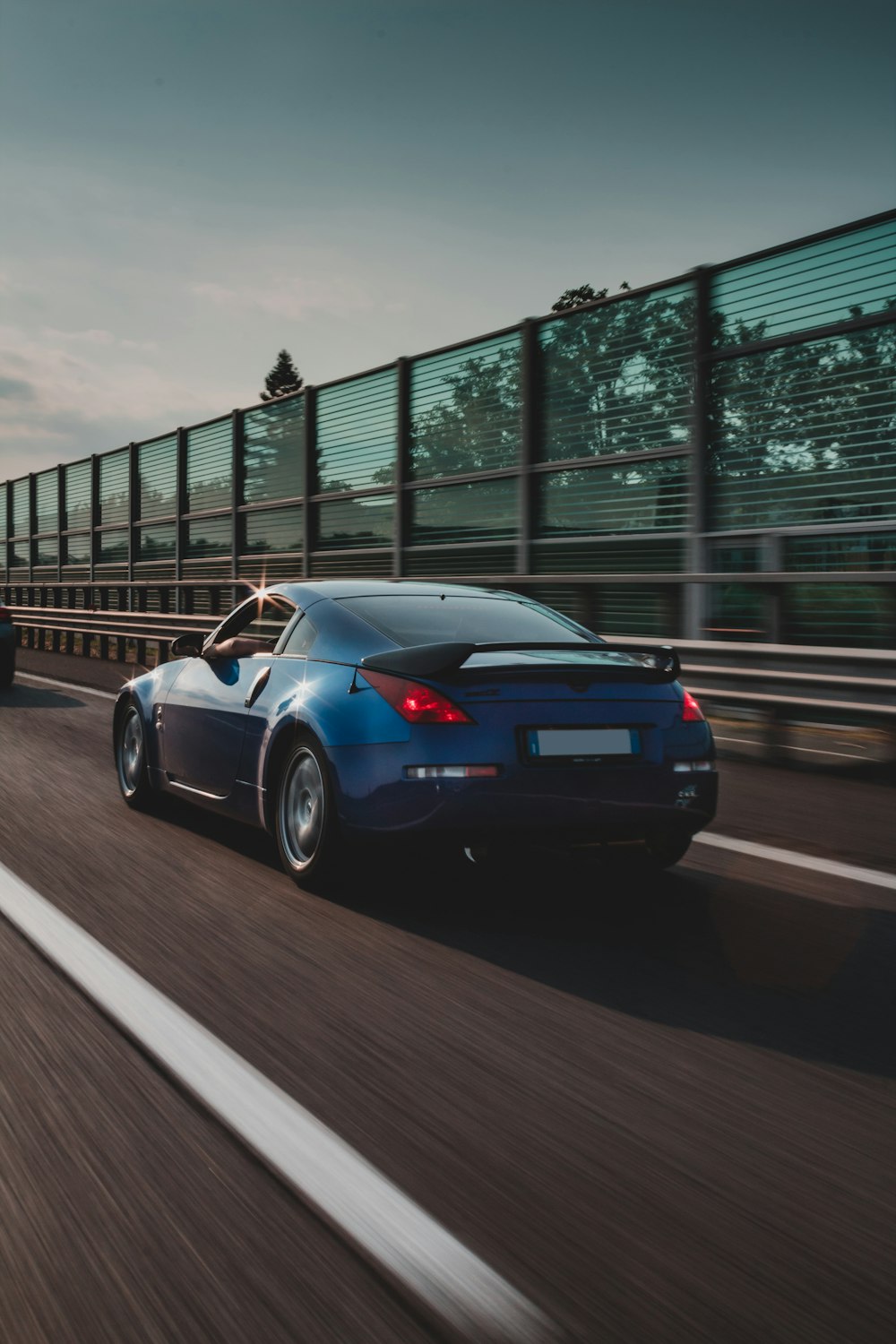 silver porsche 911 on road during daytime