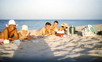 A group of happy tourists enjoying a sunny beach in Tumbes, Peru.