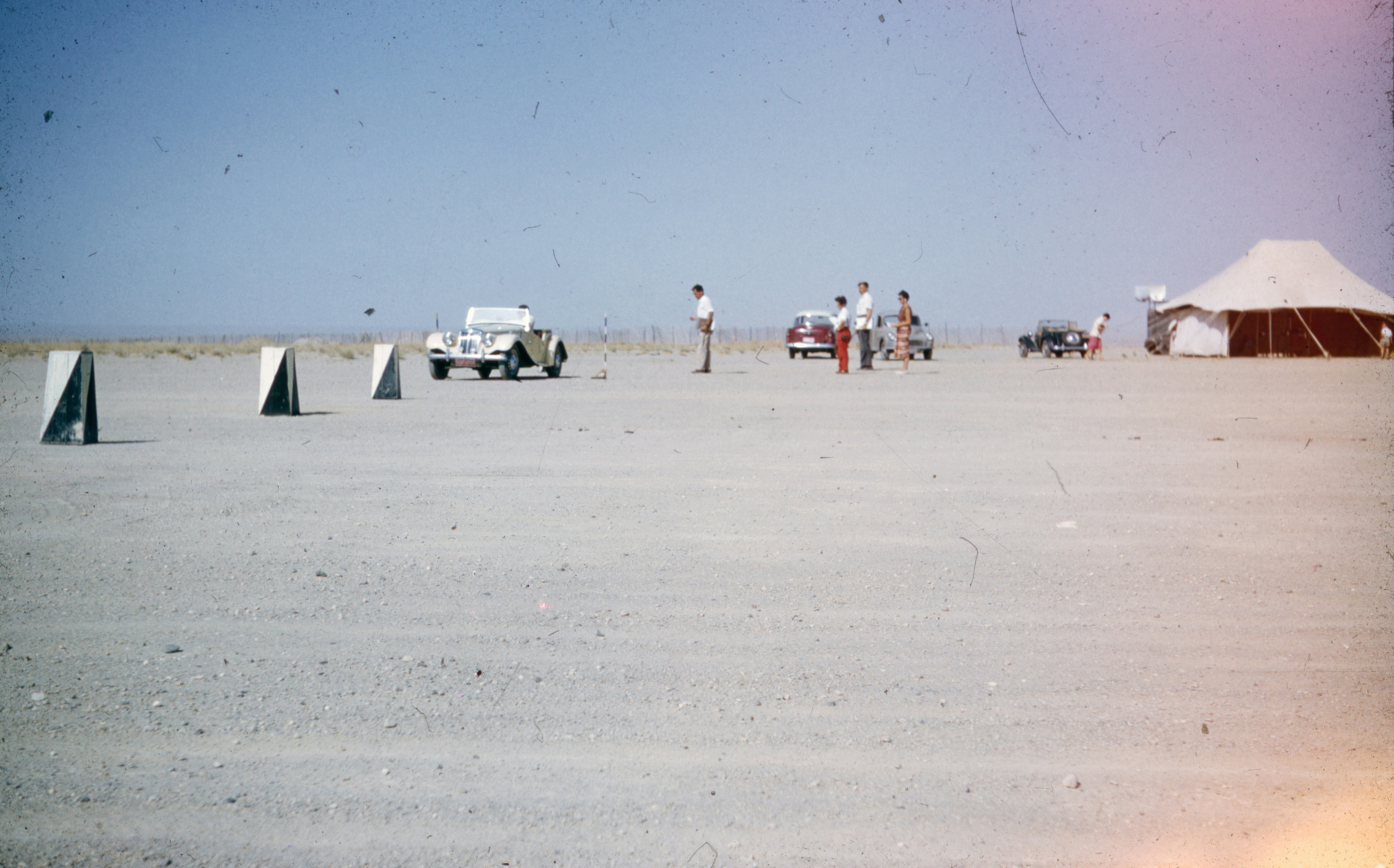 people walking on white sand beach during daytime, kuwait, old photo, old photograph, digitised slides, saudi arabia, 1950s, 1960s, 50s, 60s, vintage, arabia, uae, 