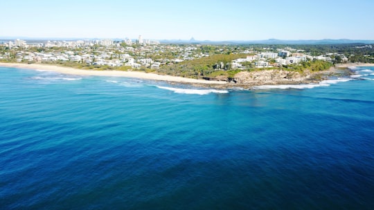 aerial view of city beside sea during daytime in Sunshine Coast QLD Australia
