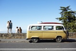 A group of travelers enjoying a scenic coastal tour in a van.