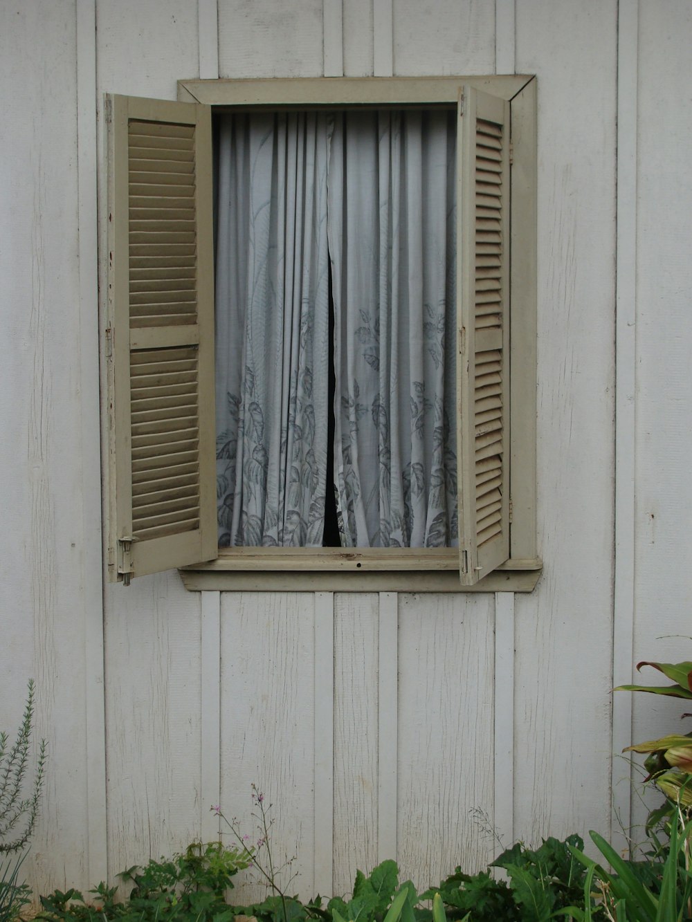 white wooden window frame on white wall
